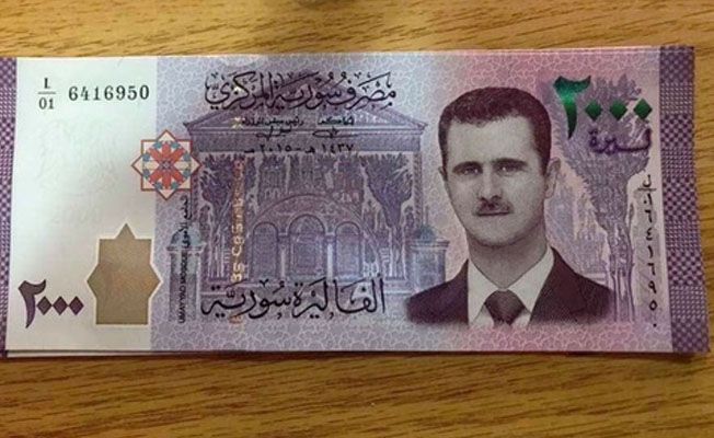Асад появился на банкнотах национальной валюты Сирии